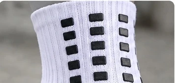 Close-up of rectangular grip elements on the sock